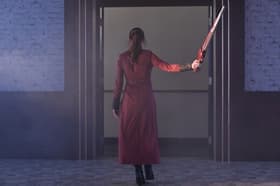 Clad in Smoke, the Crimson Assassin.